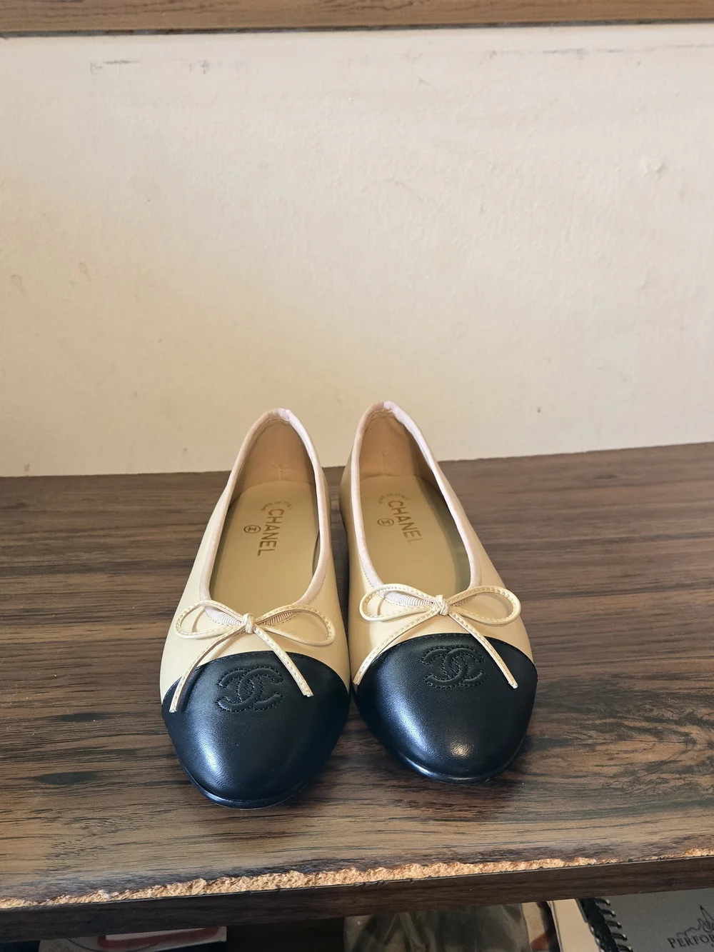 Chanel Two-Tone Leather Cap-Toe Ballet Flats in Beige & Black